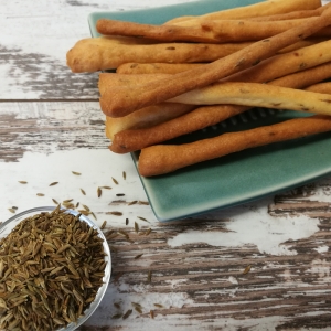 Bread sticks with goat cheese and cumin