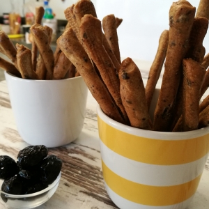 Bread sticks with blacks olives